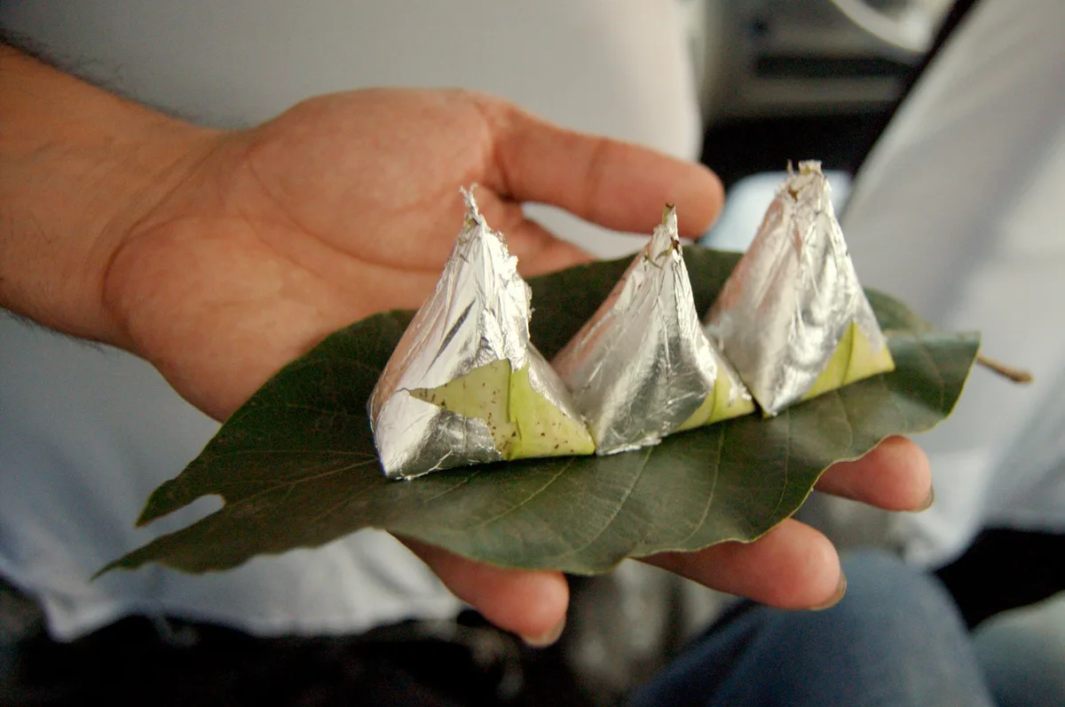 Paan — betel leaf with silver foil, the quintessential Banarasi after-meal ritual